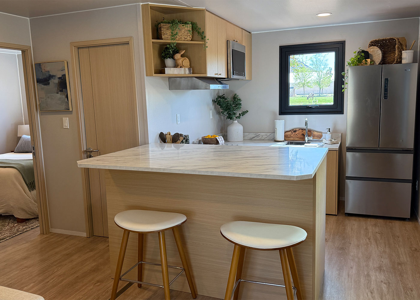 Living and kitchen wing interior of BoxHouse Bungalow 2BR