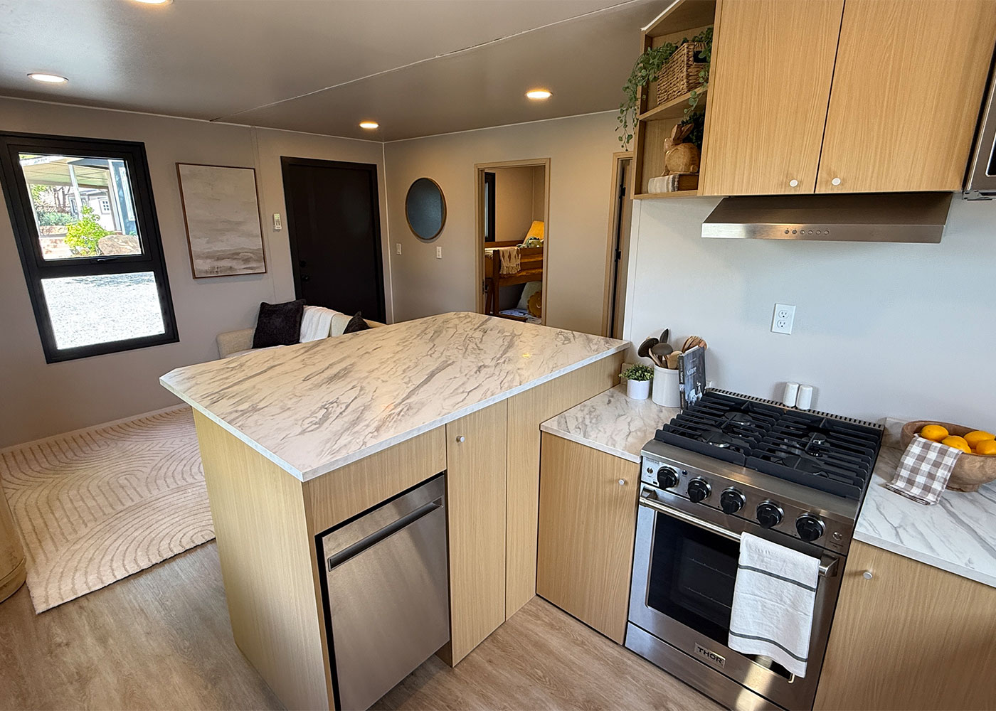 Kitchen island and counter setup in Bungalow 2BR